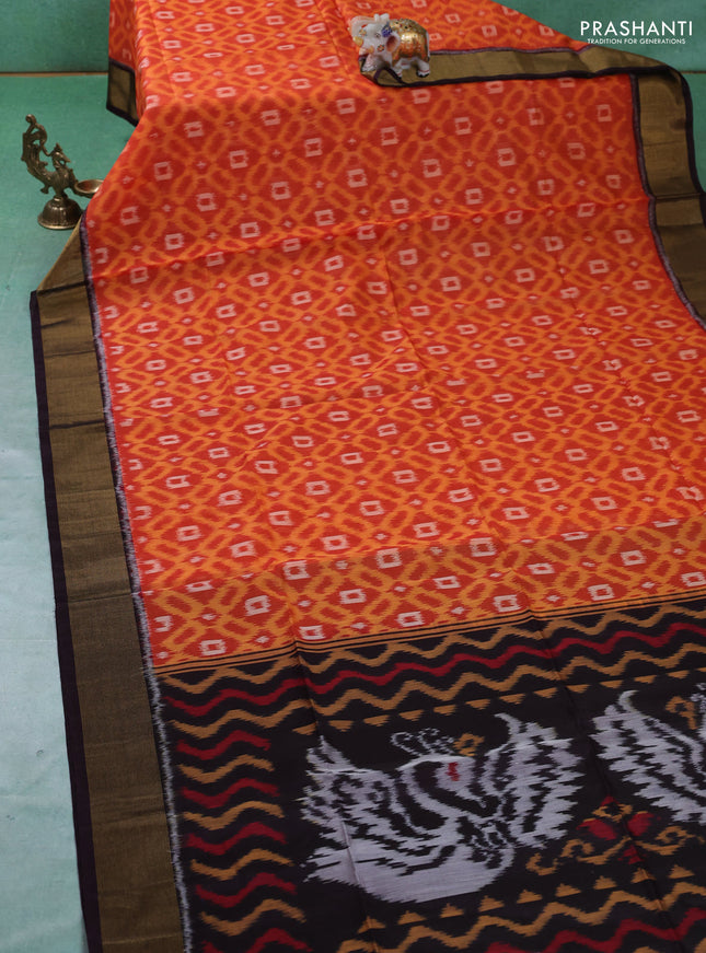 Ikat silk cotton saree orange and deep jamun with allover ikat weaves and zari woven border