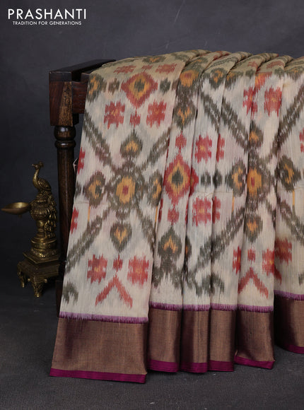 Ikat silk cotton saree cream and magenta pink with allover ikat weaves and zari woven border