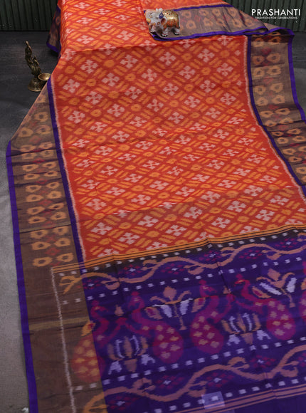 Ikat silk cotton saree orange and blue with allover ikat weaves and ikat woven zari border