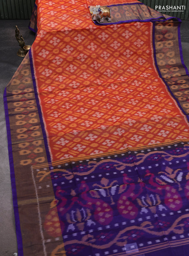Ikat silk cotton saree orange and blue with allover ikat weaves and ikat woven zari border