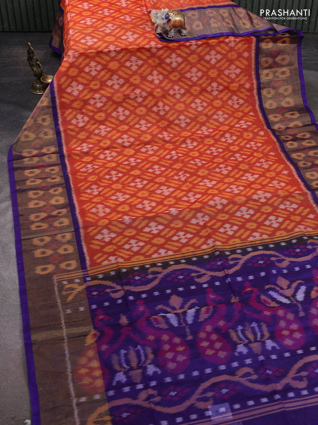 Ikat silk cotton saree orange and blue with allover ikat weaves and ikat woven zari border