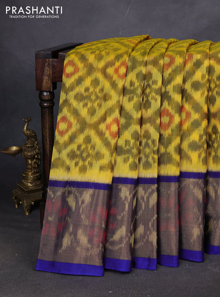 Ikat silk cotton saree yellow and blue with allover ikat weaves and ikat woven zari border