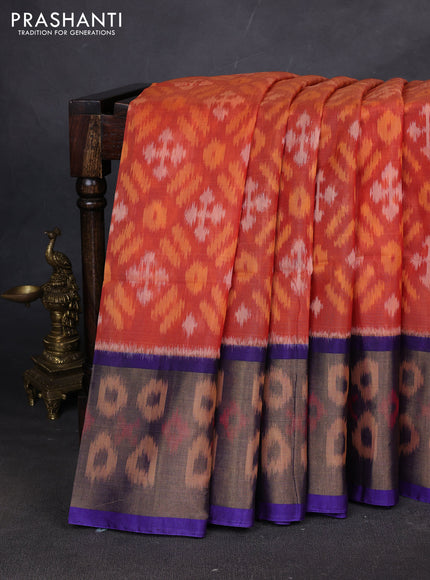 Ikat silk cotton saree orange and blue with allover ikat weaves and ikat woven zari border