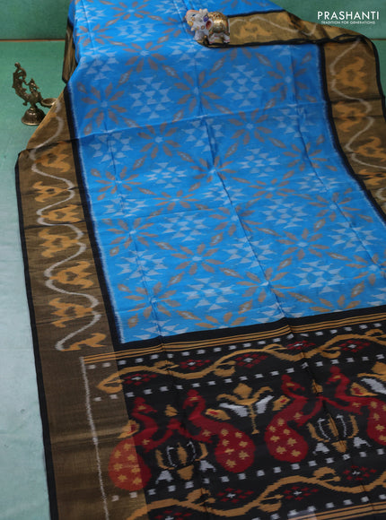 Ikat silk cotton saree cs blue and black with allover ikat weaves and ikat woven zari border