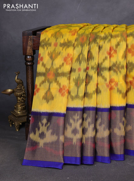 Ikat silk cotton saree yelloe and blue with allover ikat weaves and ikat woven zari border