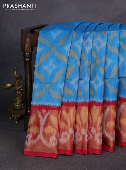 Ikat silk cotton saree cs blue and red with allover ikat weaves and ikat woven zari border
