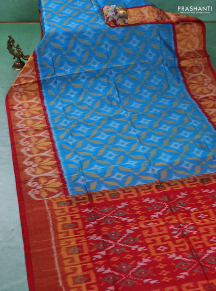 Ikat silk cotton saree cs blue and red with allover ikat weaves and ikat woven zari border