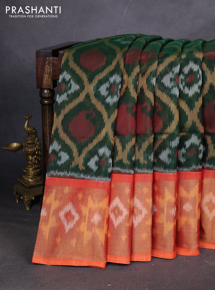 Ikat silk cotton saree green and orange with allover ikat weaves and ikat woven zari border