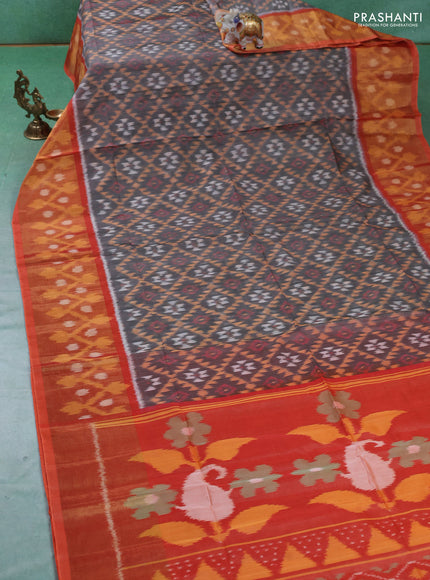 Ikat silk cotton saree grey and orange with allover ikat weaves and ikat woven zari border