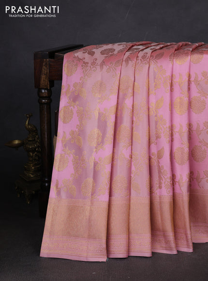 Pure kanchipuram silk saree pastel pink with allover zari woven floral weaves and zari woven border