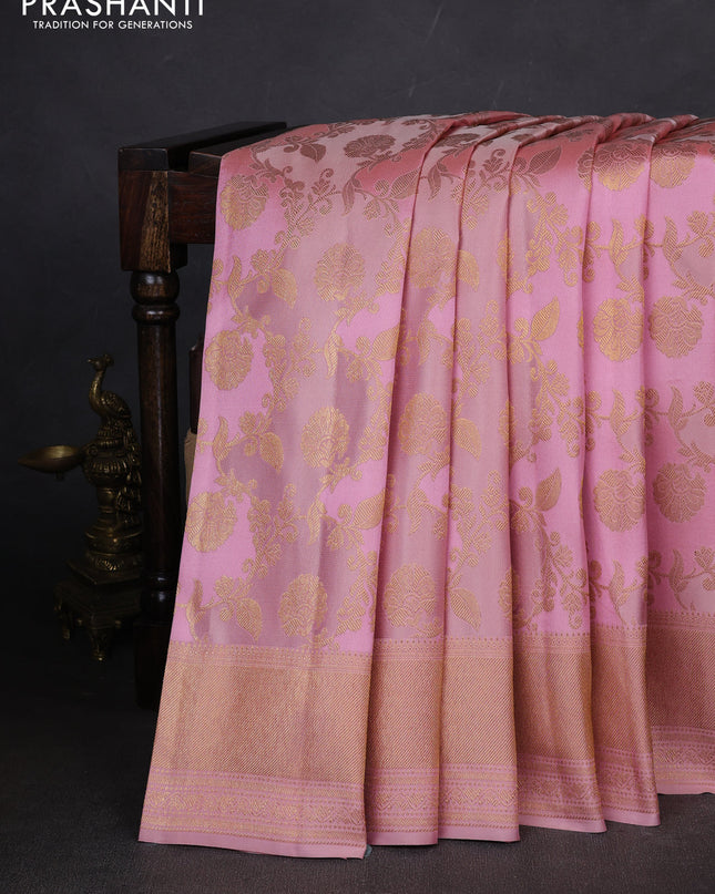 Pure kanchipuram silk saree pastel pink with allover zari woven floral weaves and zari woven border
