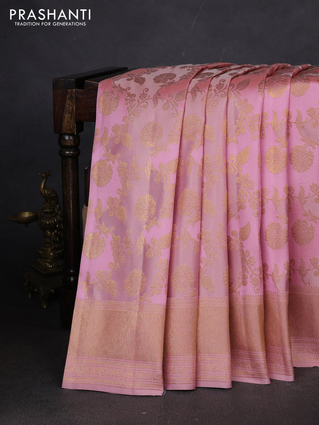 Pure kanchipuram silk saree pastel pink with allover zari woven floral weaves and zari woven border