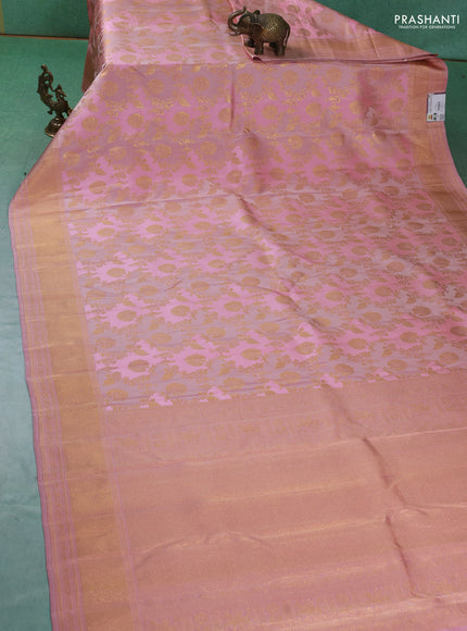 Pure kanchipuram silk saree pastel pink with allover zari woven floral weaves and zari woven border