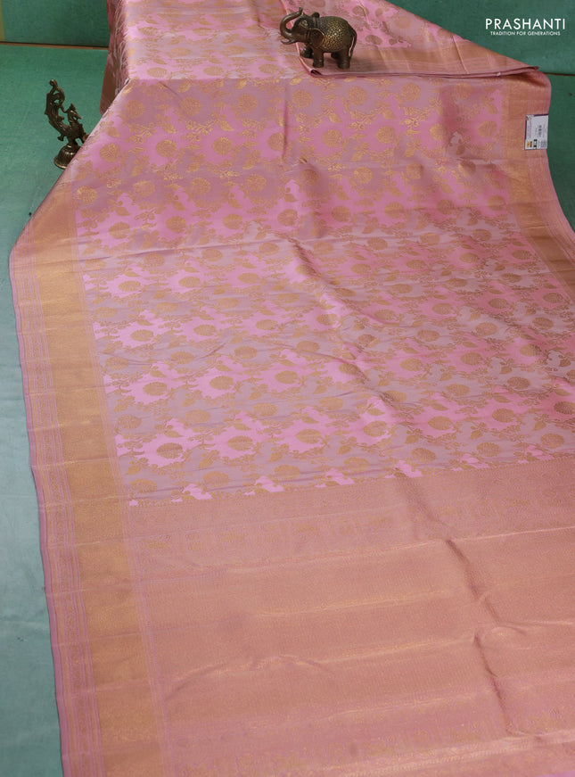 Pure kanchipuram silk saree pastel pink with allover zari woven floral weaves and zari woven border