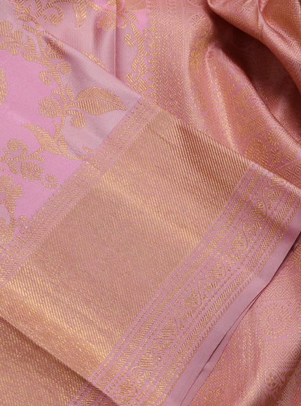 Pure kanchipuram silk saree pastel pink with allover zari woven floral weaves and zari woven border