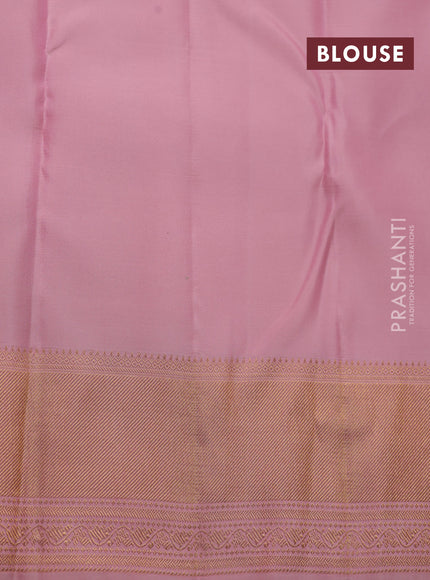 Pure kanchipuram silk saree pastel pink with allover zari woven floral weaves and zari woven border