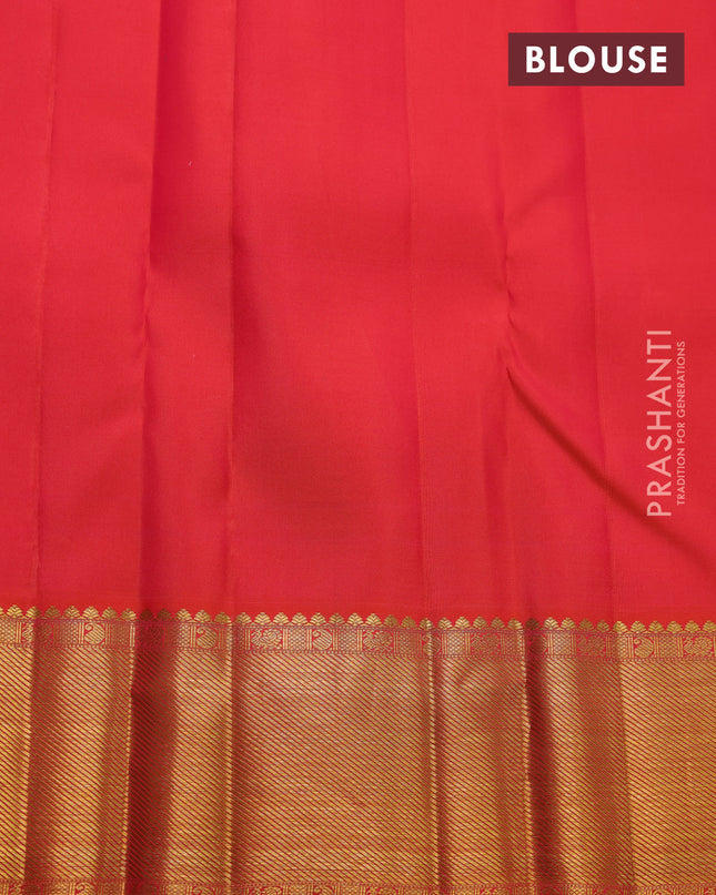 Pure kanchipuram silk saree dual shade of pinkish orange with allover zari checks & buttas and zari woven border