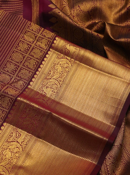 Pure kanchipuram silk saree maroon with allover zari woven brocade weaves and zari woven border