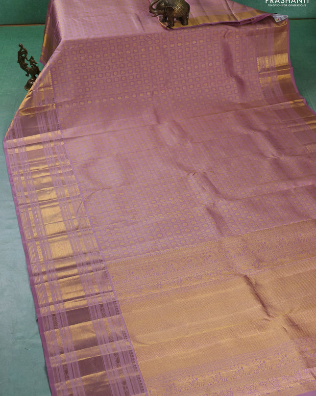 Pure kanchipuram silk saree pastel pink with allover zari checks & buttas and long zari woven border