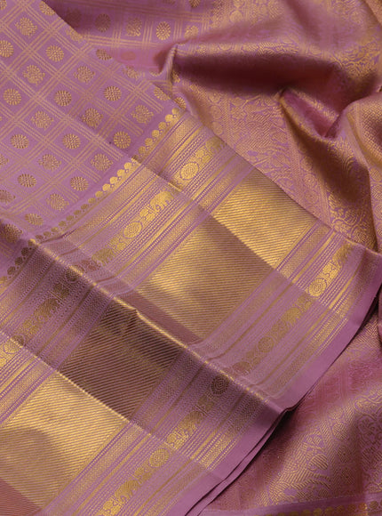 Pure kanchipuram silk saree pastel pink with allover zari checks & buttas and long zari woven border