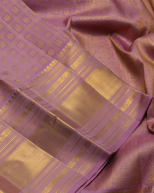 Pure kanchipuram silk saree pastel pink with allover zari checks & buttas and long zari woven border