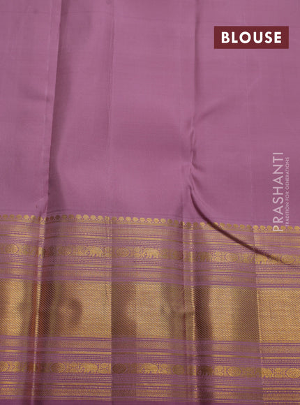 Pure kanchipuram silk saree pastel pink with allover zari checks & buttas and long zari woven border