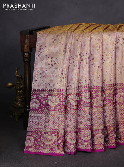 Pure kanchipuram tissue silk saree mild peach and purple with allover zari woven brocade weaves and long zari woven border