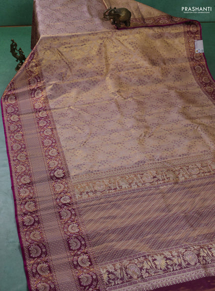Pure kanchipuram tissue silk saree mild peach and purple with allover zari woven brocade weaves and long zari woven border