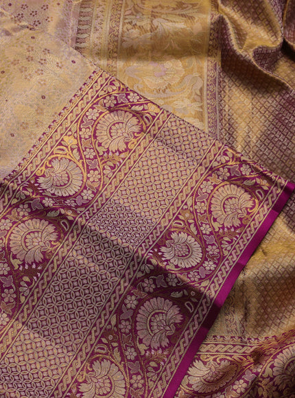 Pure kanchipuram tissue silk saree mild peach and purple with allover zari woven brocade weaves and long zari woven border