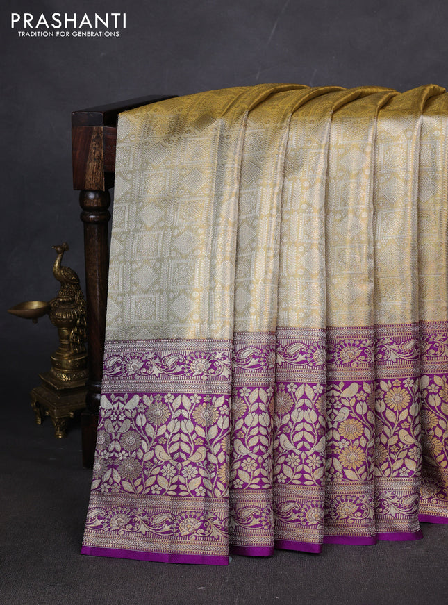 Pure kanchipuram tissue silk saree cream and purple with allover zari woven brocade weaves and long zari woven border