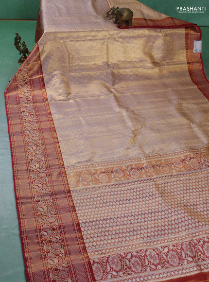 Pure kanchipuram tissue silk saree sandal and maroon with allover zari woven brocade weaves and long zari woven border