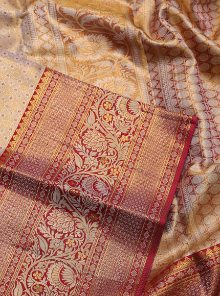 Pure kanchipuram tissue silk saree sandal and maroon with allover zari woven brocade weaves and long zari woven border