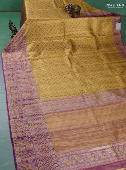 Pure kanchipuram tissue silk saree gold and lavender with allover zari woven brocade weaves and long zari woven border