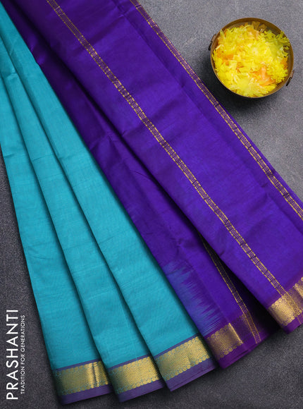 Silk cotton saree teal blue and blue with plain body and zari woven border