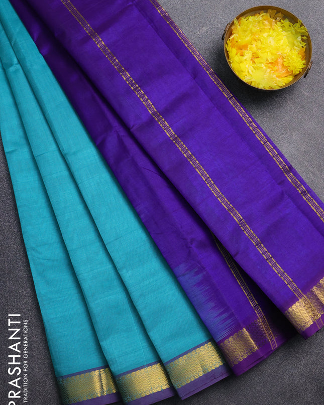 Silk cotton saree teal blue and blue with plain body and zari woven border