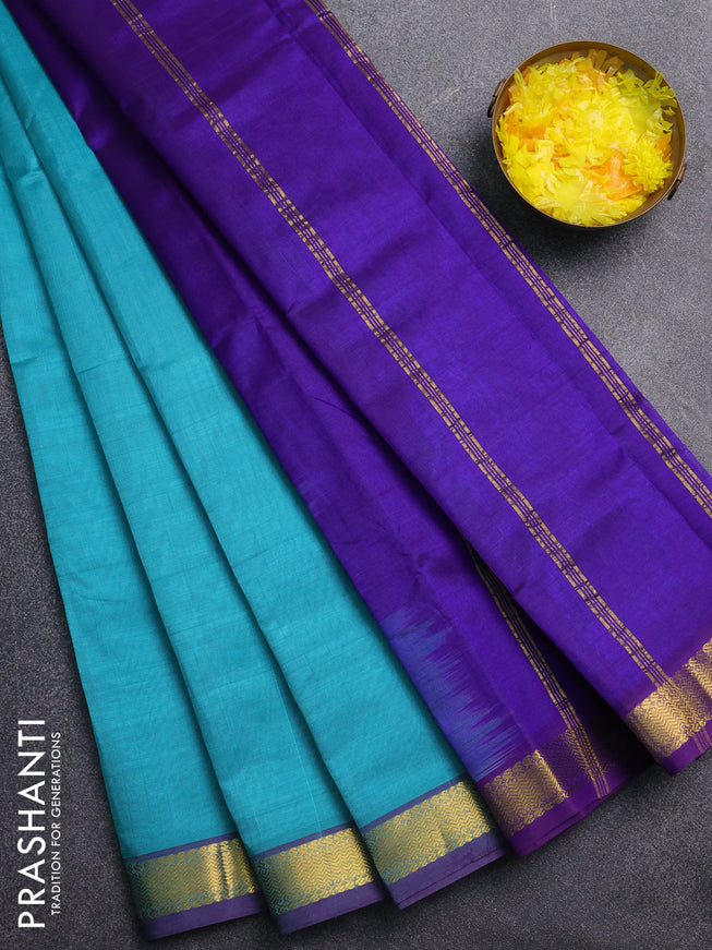 Silk cotton saree teal blue and blue with plain body and zari woven border
