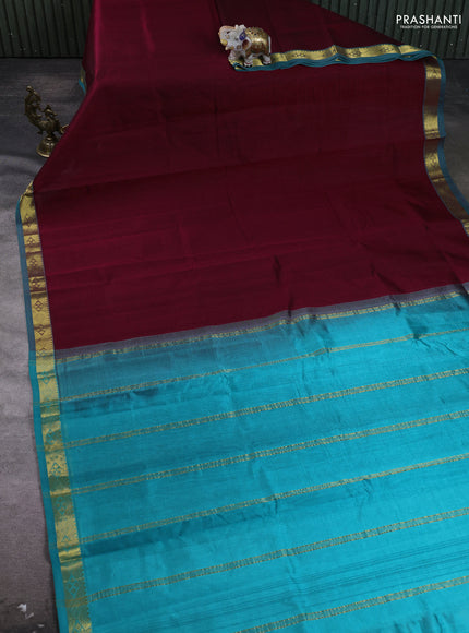 Silk cotton saree maroon and teal blue with plain body and zari woven border