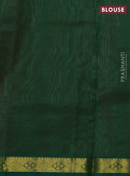 Silk cotton saree pale orange and green with plain body and zari woven border