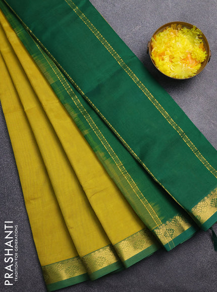 Silk cotton saree lime yellow and green with plain body and zari woven border