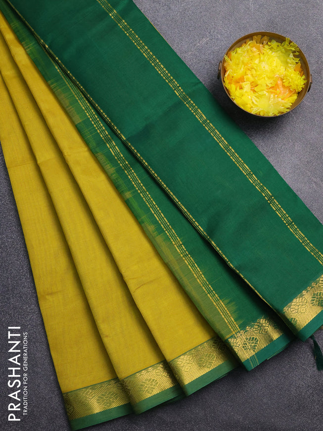 Silk cotton saree lime yellow and green with plain body and zari woven border