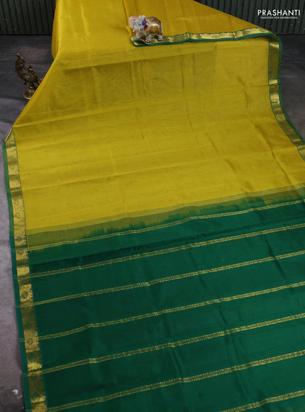 Silk cotton saree lime yellow and green with plain body and zari woven border