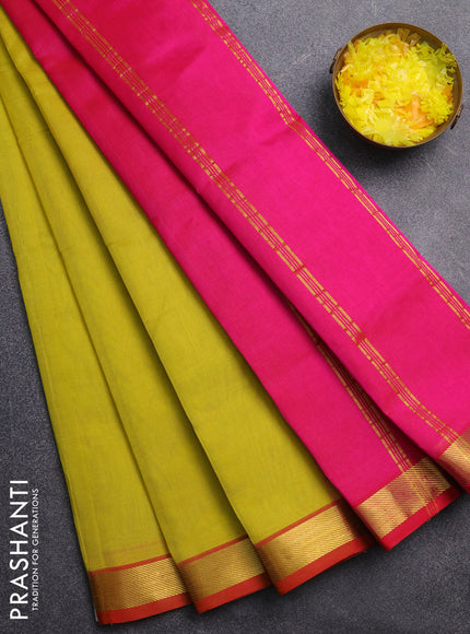 Silk cotton saree lime yellow and pink with plain body and zari woven border