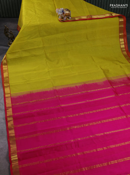 Silk cotton saree lime yellow and pink with plain body and zari woven border