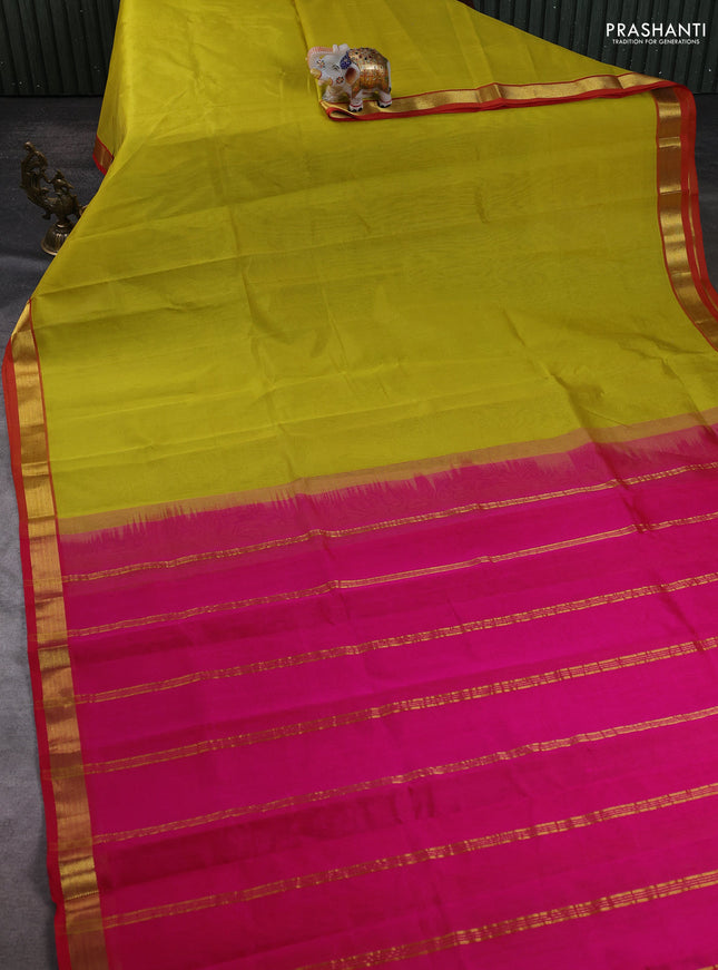 Silk cotton saree lime yellow and pink with plain body and zari woven border