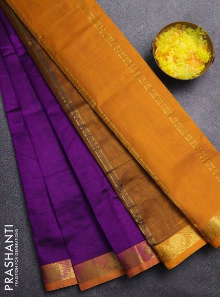 Silk cotton saree deep purple and mustard yellow with plain body and zari woven border
