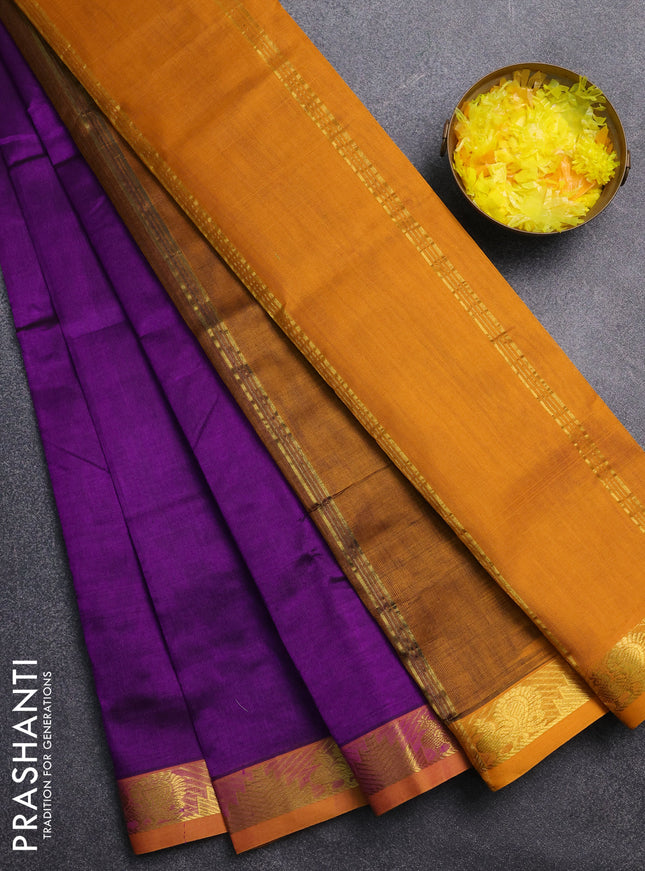 Silk cotton saree deep purple and mustard yellow with plain body and zari woven border