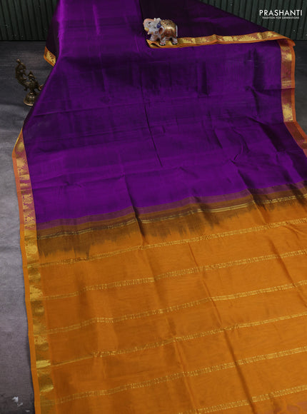 Silk cotton saree deep purple and mustard yellow with plain body and zari woven border