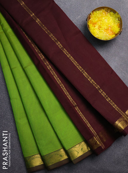 Silk cotton saree light green and deep wine with plain body and zari woven border