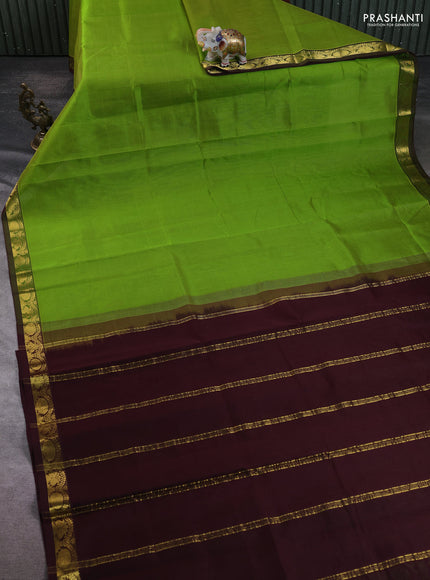 Silk cotton saree light green and deep wine with plain body and zari woven border