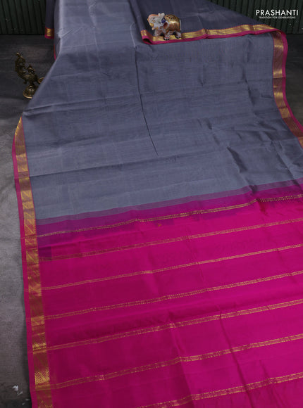 Silk cotton saree grey and pink with plain body and zari woven border